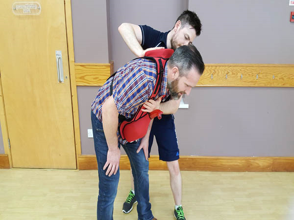 Trainee illustrates how to effectively give backslaps to a choking casualty